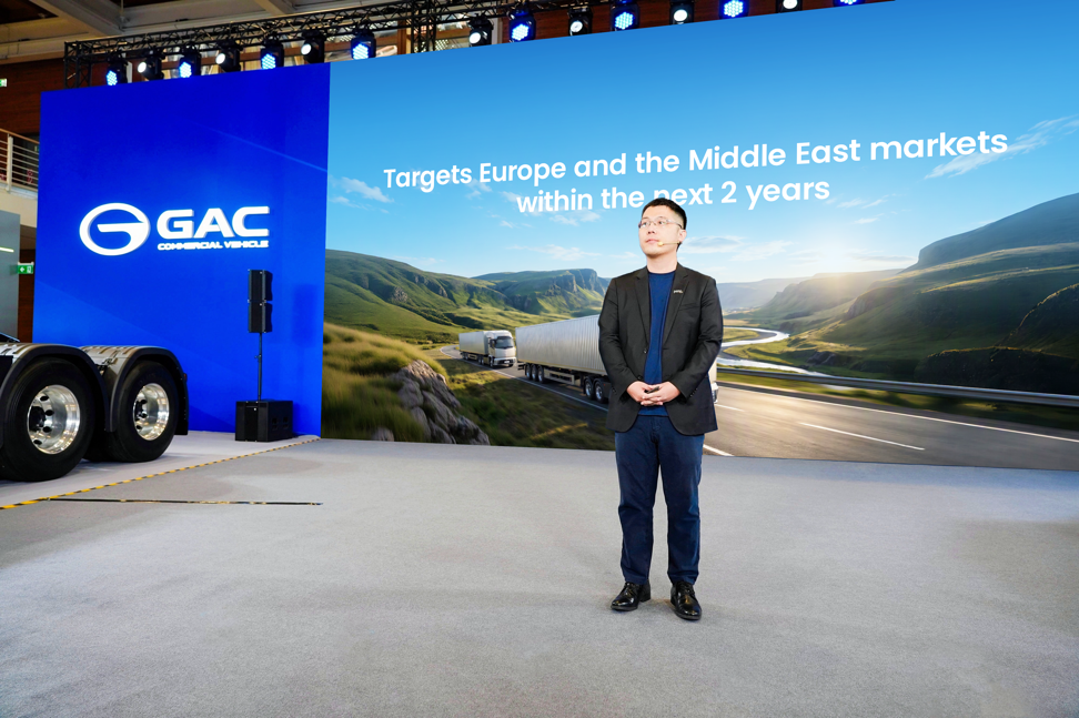 A person standing in front of a large sign

AI-generated content may be incorrect.