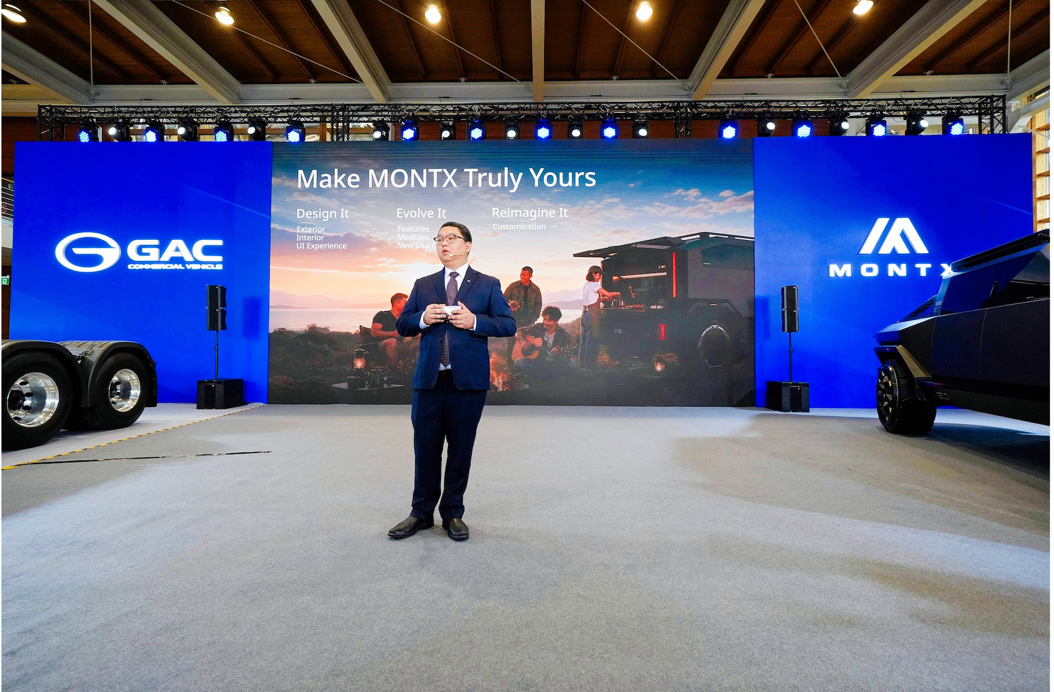 A person standing in front of a large banner

AI-generated content may be incorrect.